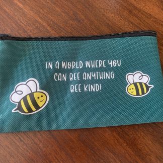 green pencil case with bees and saying: in a world where you can bee anything bee kind