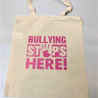 canvas bag with the words 'bullying stops here' in pink