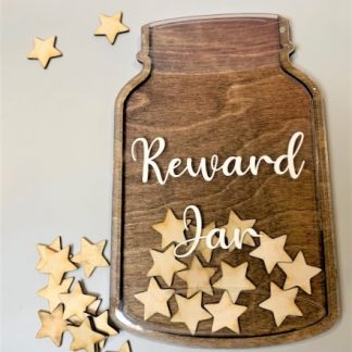 Laser cut wooden jar with clear acrylic with the word 'reward jar' in white on the front. Small laser cut starts scattered inside and around the jar.