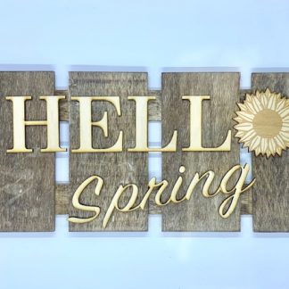 Wooden pallet sign with laser engraved letters that say 'Hello Spring'
