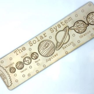 laser engraved puzzle of wood with each planet cut out