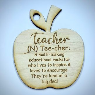 Laser engraved apple on wood, with the words: Teacher