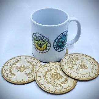 mug with colour bee print design and laser cut wooden bee coasters set