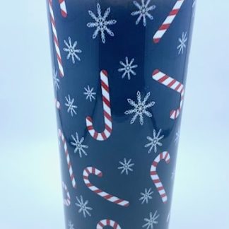 Blue Sublimation tumbler with snowflakes and candy canes on them