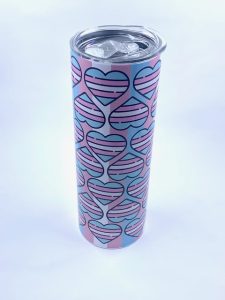 Sublimation Tumbler with Transgender flag and hearts printed on it. 