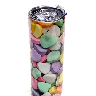 20 oz metal tumbler with candy heart image sublimated on it.