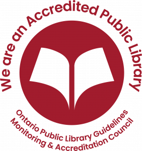 Photo of red circle with words surrounding it. "We are an Accredited Public Library"