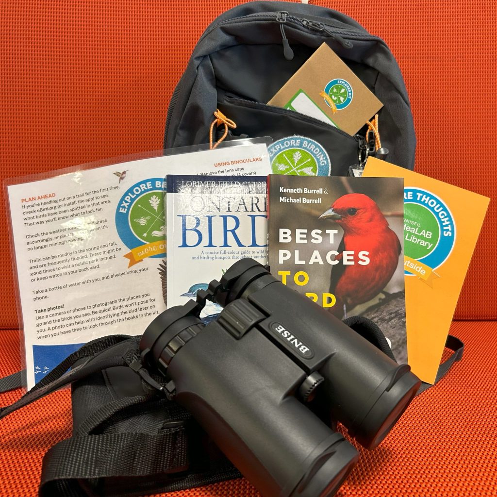 Explore Birding Kit : Backpack for adults kit. Includes 2 books (Best Places to Bird in Ontario by Kenneth Burrell ; Ontario Birds by Jeffrey Domm), 1 binoculars, 1 journal, 1 backpack. 